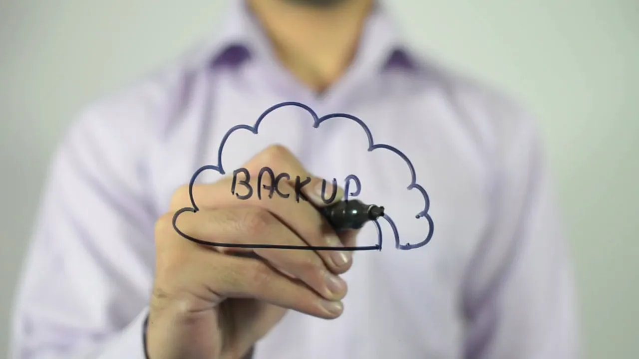 Illustration showing a hand writing inside a cloud shape with a marker for offline crypto backup concept